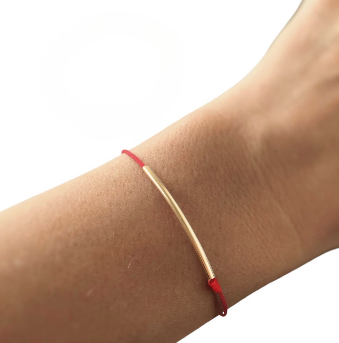 Tube d’or 18k sur corde de soie naturelle