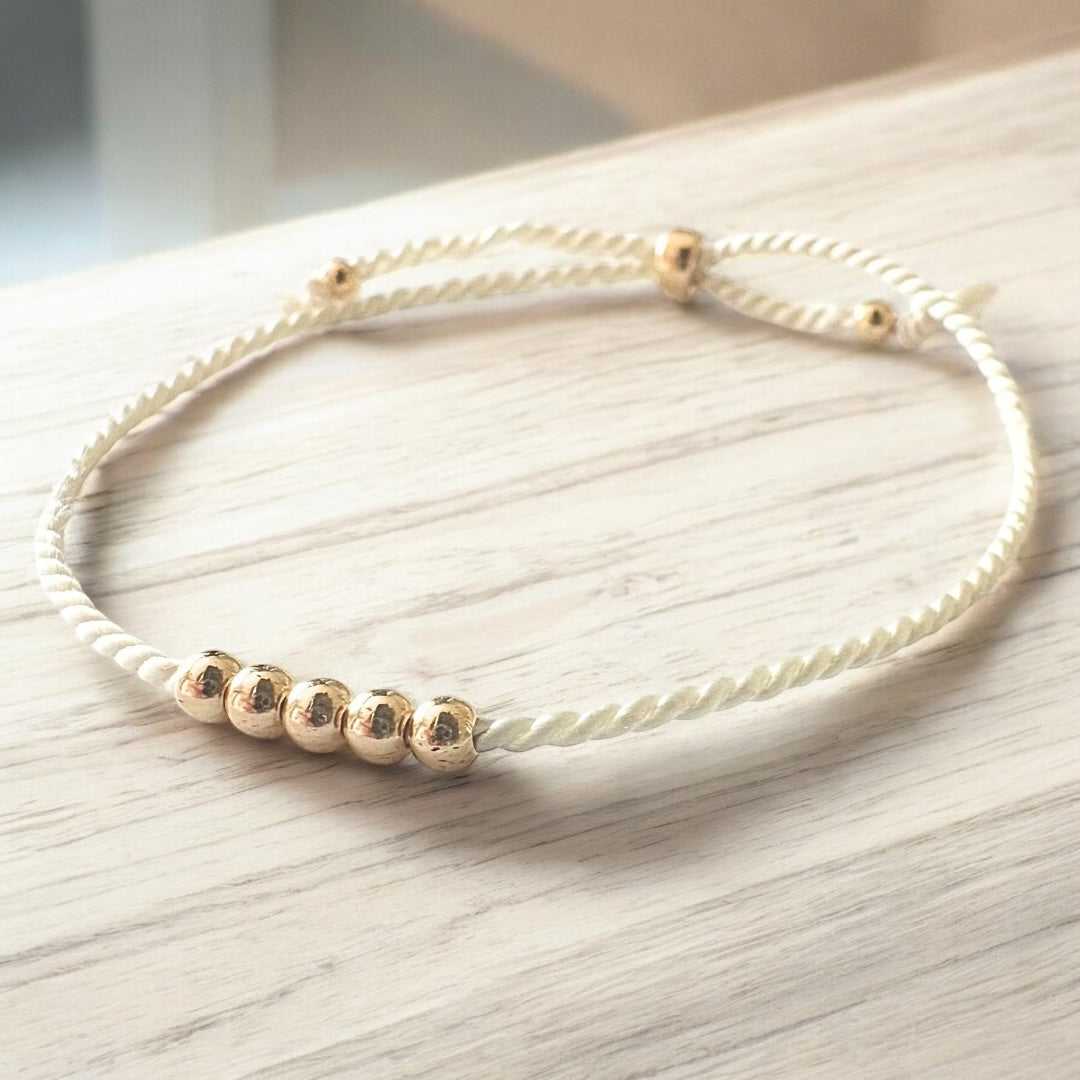 Bracelet Or 14K et soie naturelle