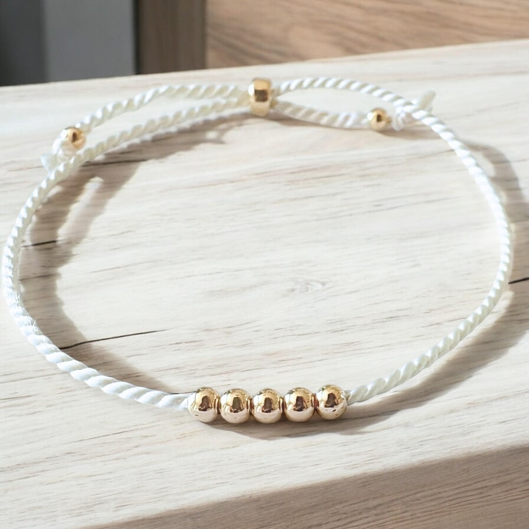 Bracelet Or 14K et soie naturelle