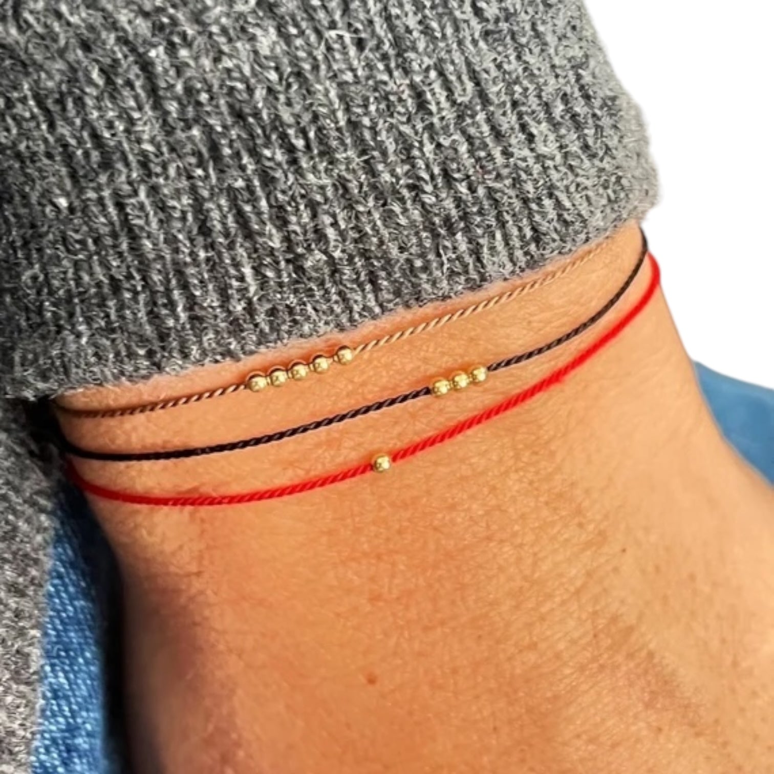 Billes d’or massif 18k sur corde de soie naturelle