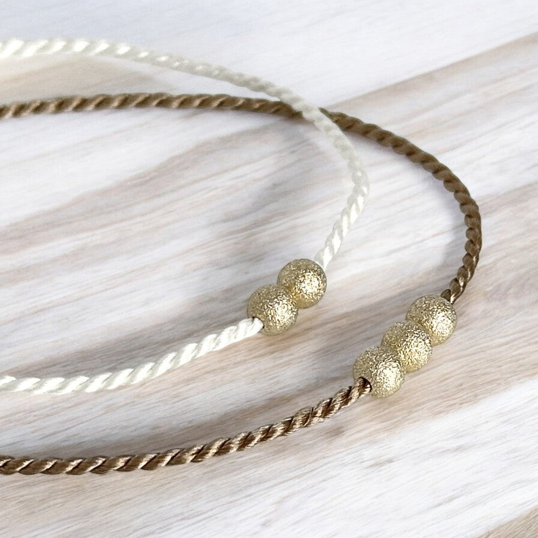 Bracelet Or 14K, poussière d'étoiles et soie naturelle