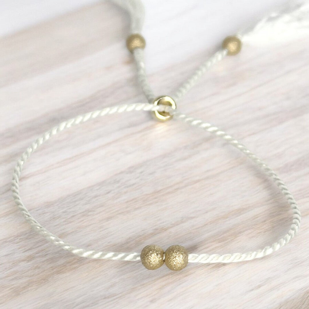 Bracelet Or 14K, poussière d'étoiles et soie naturelle